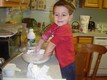 Riley mixing biscuit dough